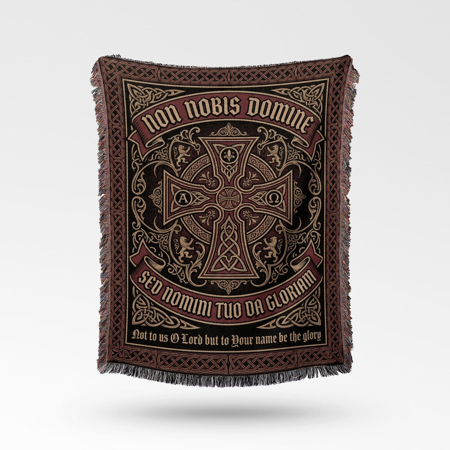 Tapestry blanket with ornate Celtic knot design and Latin text.