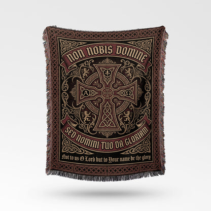 Tapestry blanket with ornate Celtic knot design and Latin text.