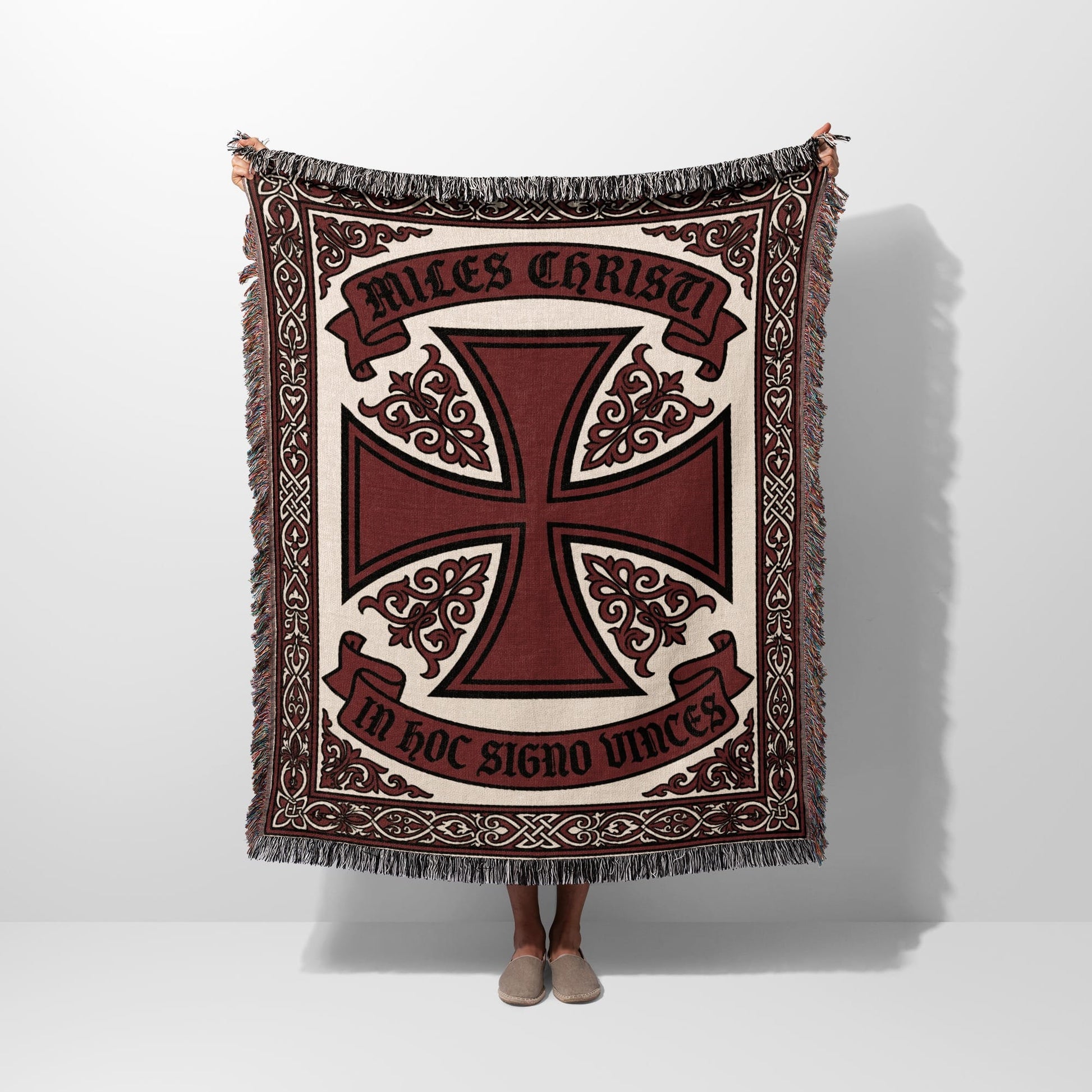 Tapestry blanket with Maltese cross design and text "In Hoc Signo Vinces".