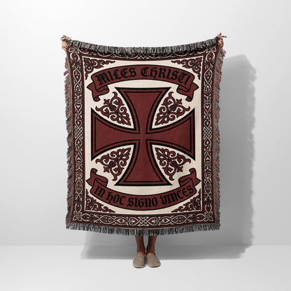 Tapestry blanket with Maltese cross design and text "In Hoc Signo Vinces".