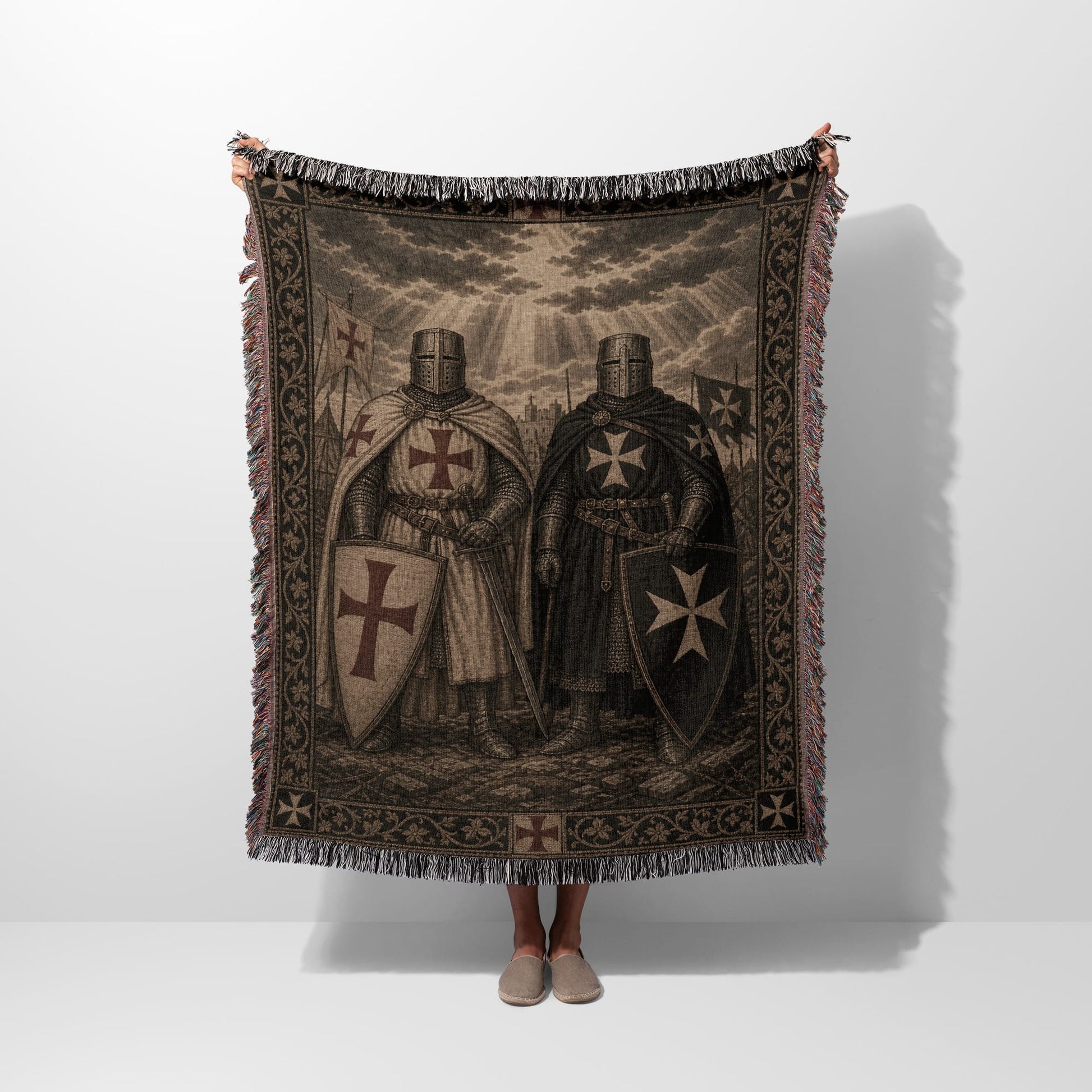 Two armored knights, one with a red cross, stand holding shields.