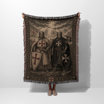 Two armored knights, one with a red cross, stand holding shields.