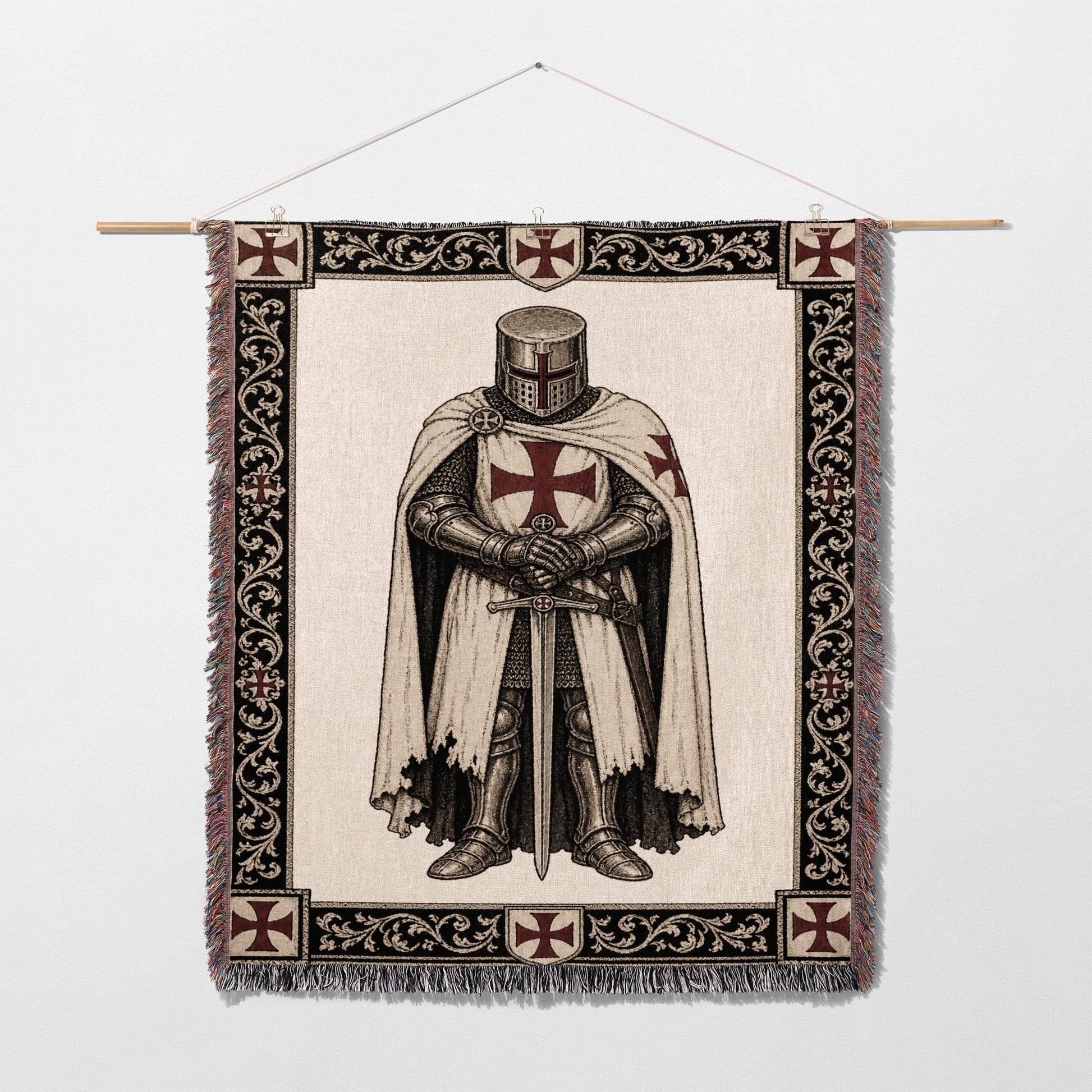 Tapestry depicting a Templar knight in armor with sword and cross.