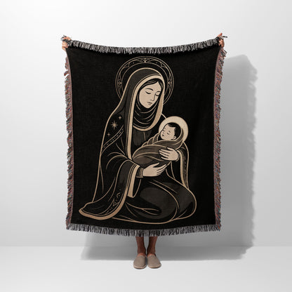 Tapestry with a depiction of Mary holding the infant Jesus.
