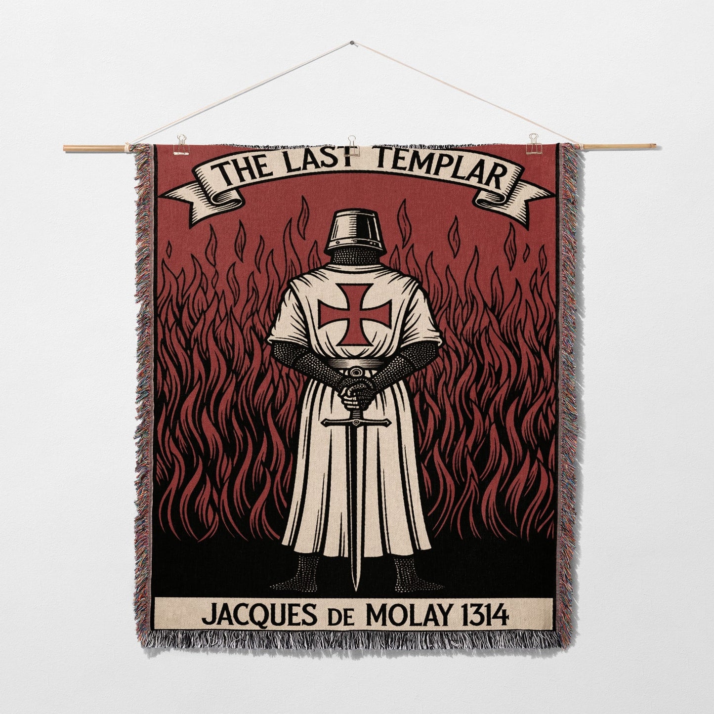 Tapestry depicting Jacques de Molay in armor with sword against flames.