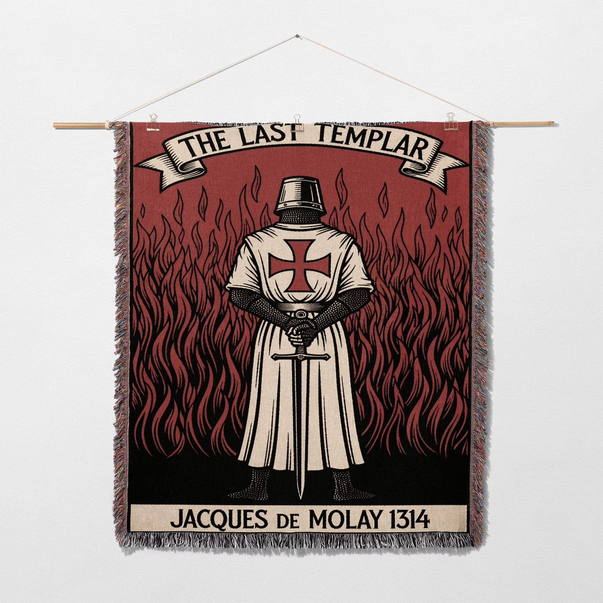 Tapestry depicting Jacques de Molay in armor with sword against flames.