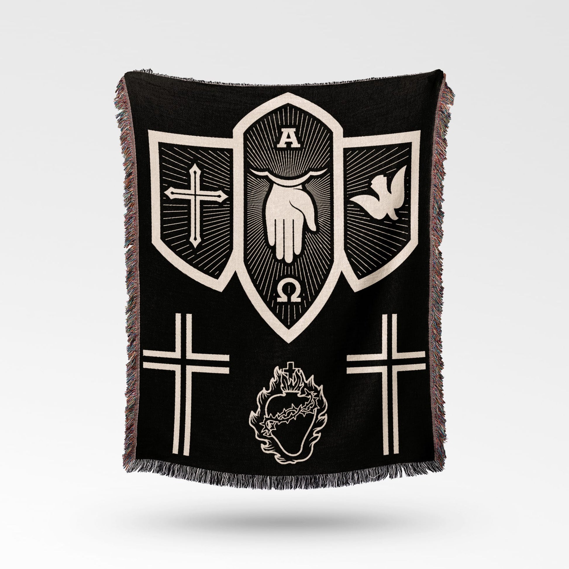 Black woven blanket with religious symbols: cross, dove, hand, omega, and sacred heart.