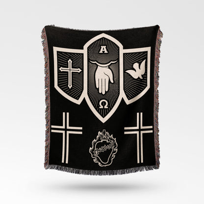 Black woven blanket with religious symbols: cross, dove, hand, omega, and sacred heart.