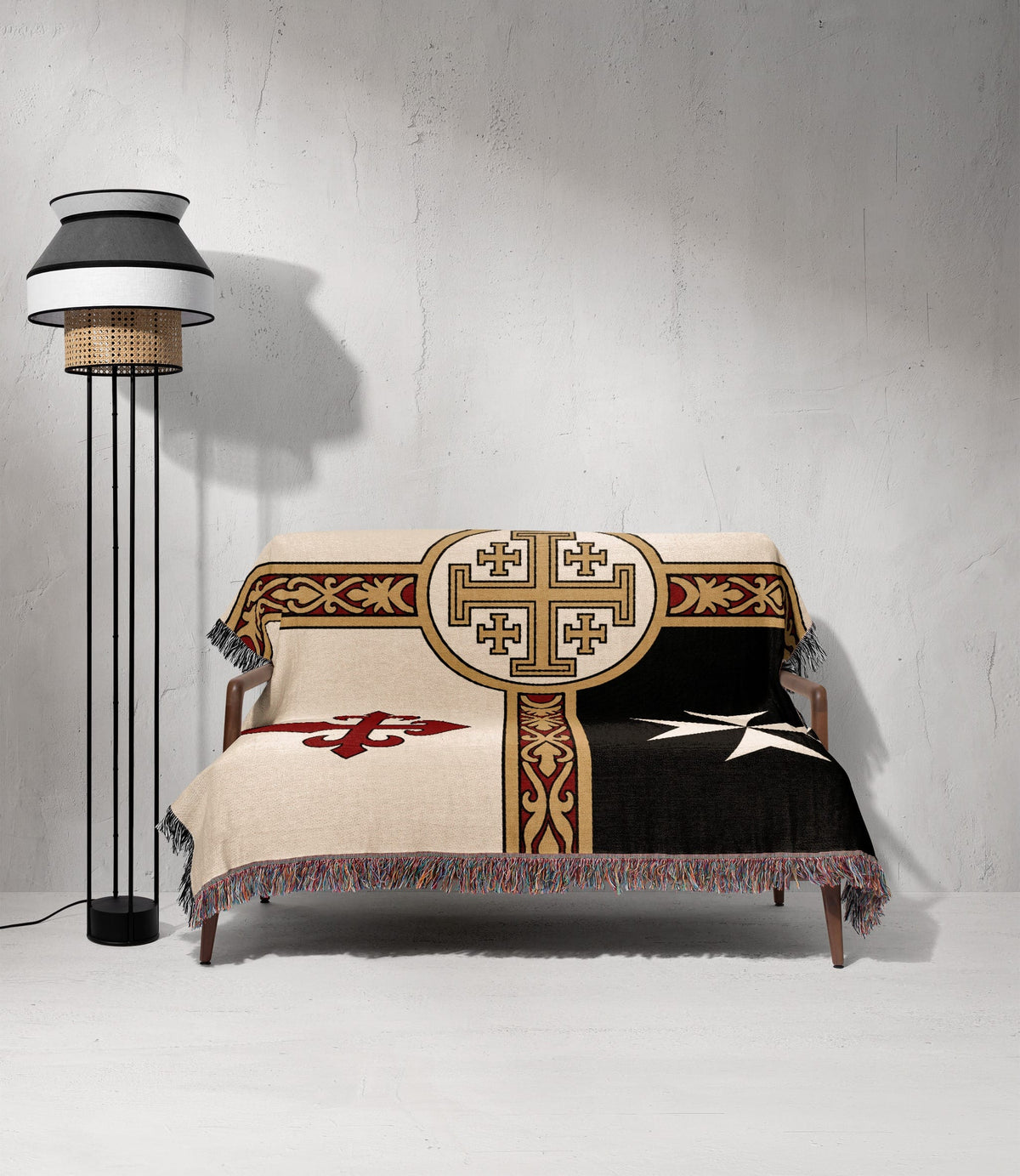 Throw blanket featuring a Jerusalem cross on cream, red cross on cream, and white star on black.
