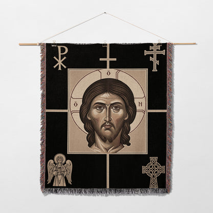 Orthodox icon of Christ Pantocrator with angel and Celtic cross on tapestry.