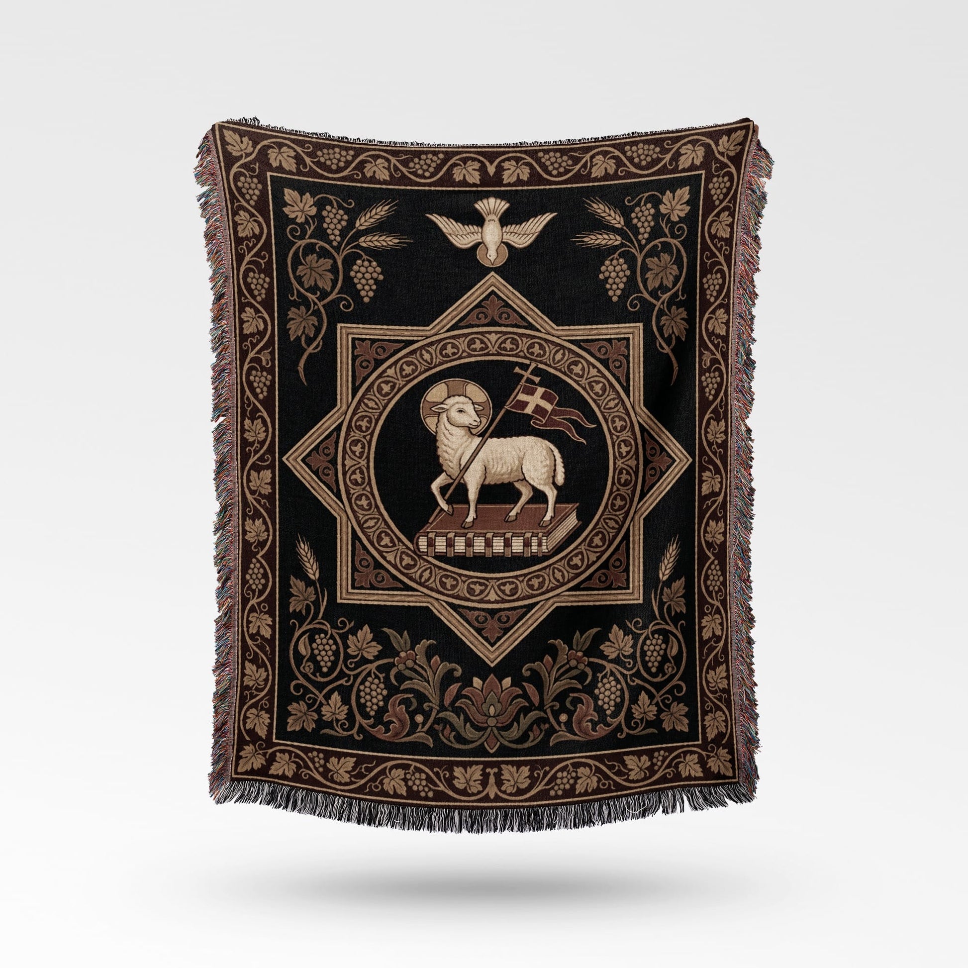 Tapestry blanket with a lamb on a book and a dove, bordered by vines.