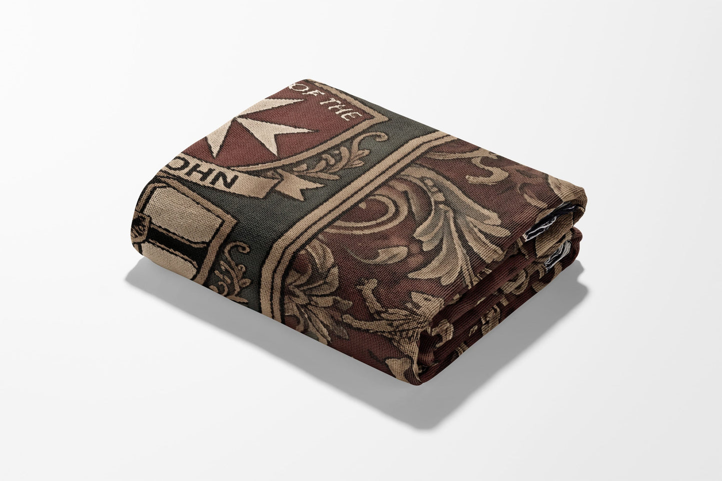 Folded tapestry featuring a crest with text including "OF THE" and "JOHN."