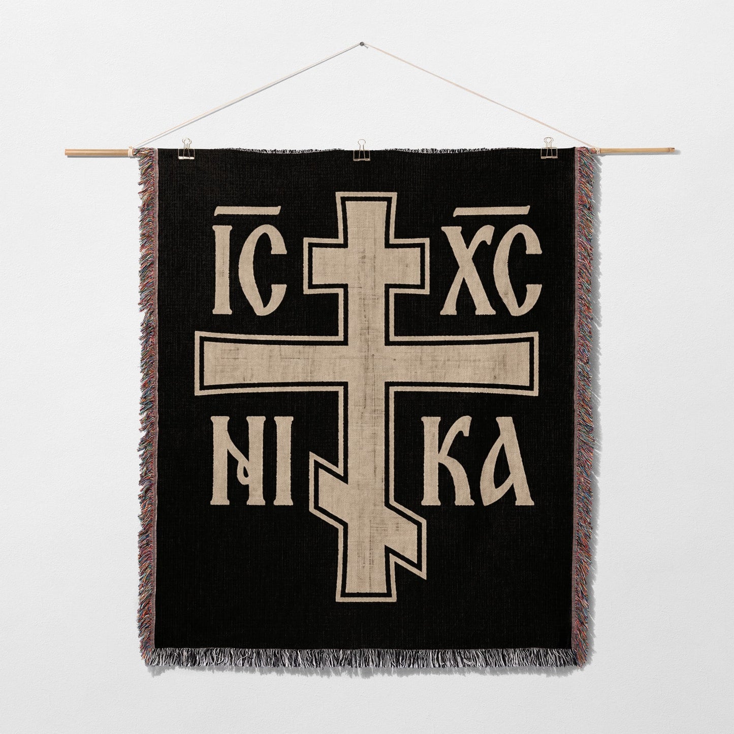 Black tapestry with white cross and "IC XC NIKA" text.