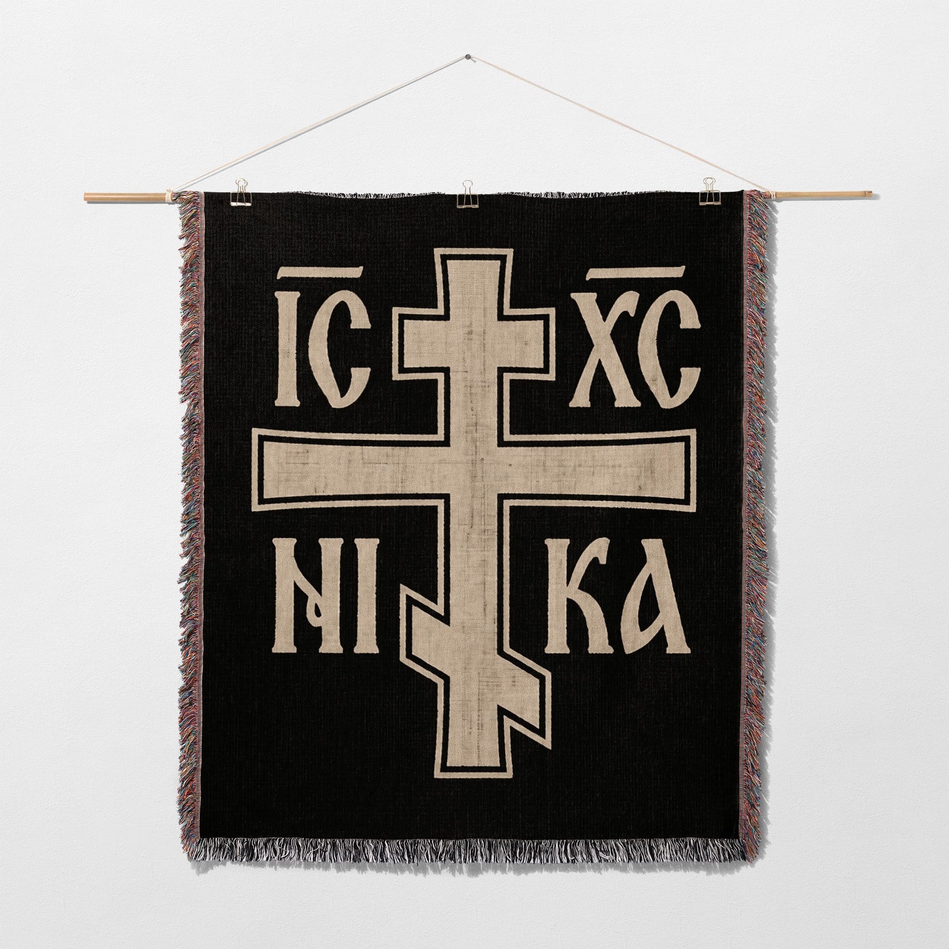 Black tapestry with white cross and "IC XC NIKA" text.