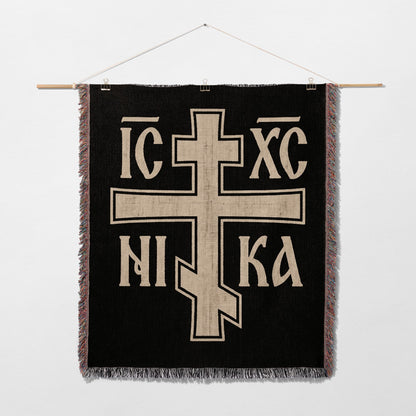 Black tapestry with white cross and "IC XC NIKA" text.