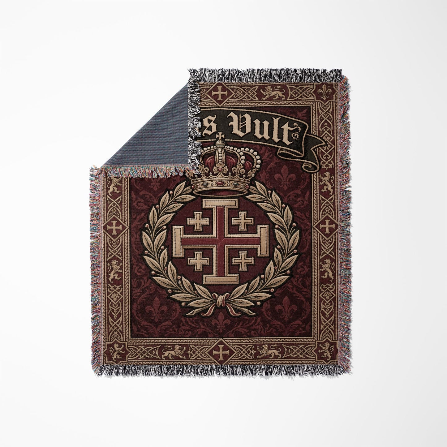 Woven tapestry throw with crown, Jerusalem cross, and "Deus Vult" text.