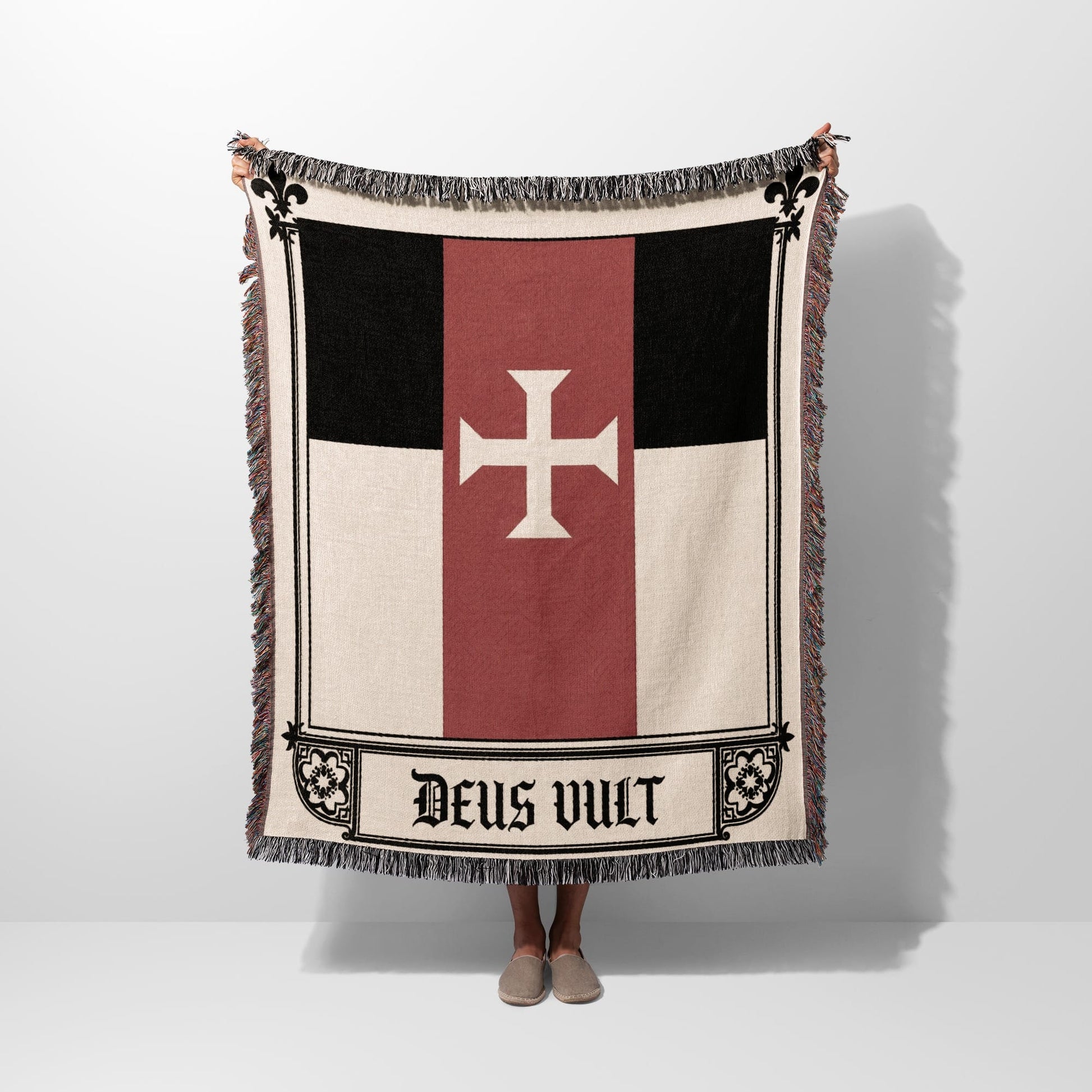 Woven tapestry flag with white cross and "Deus Vult" text.