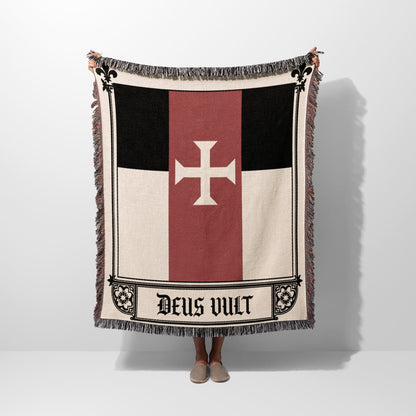 Woven tapestry flag with white cross and "Deus Vult" text.