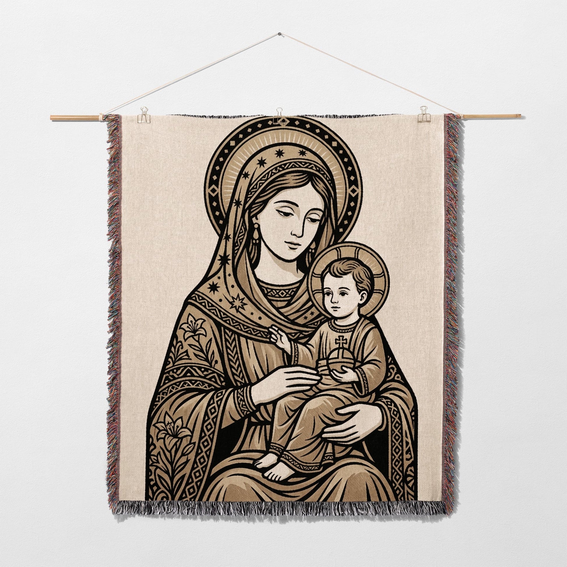 Tapestry of the Virgin Mary holding the infant Jesus, with ornate border.