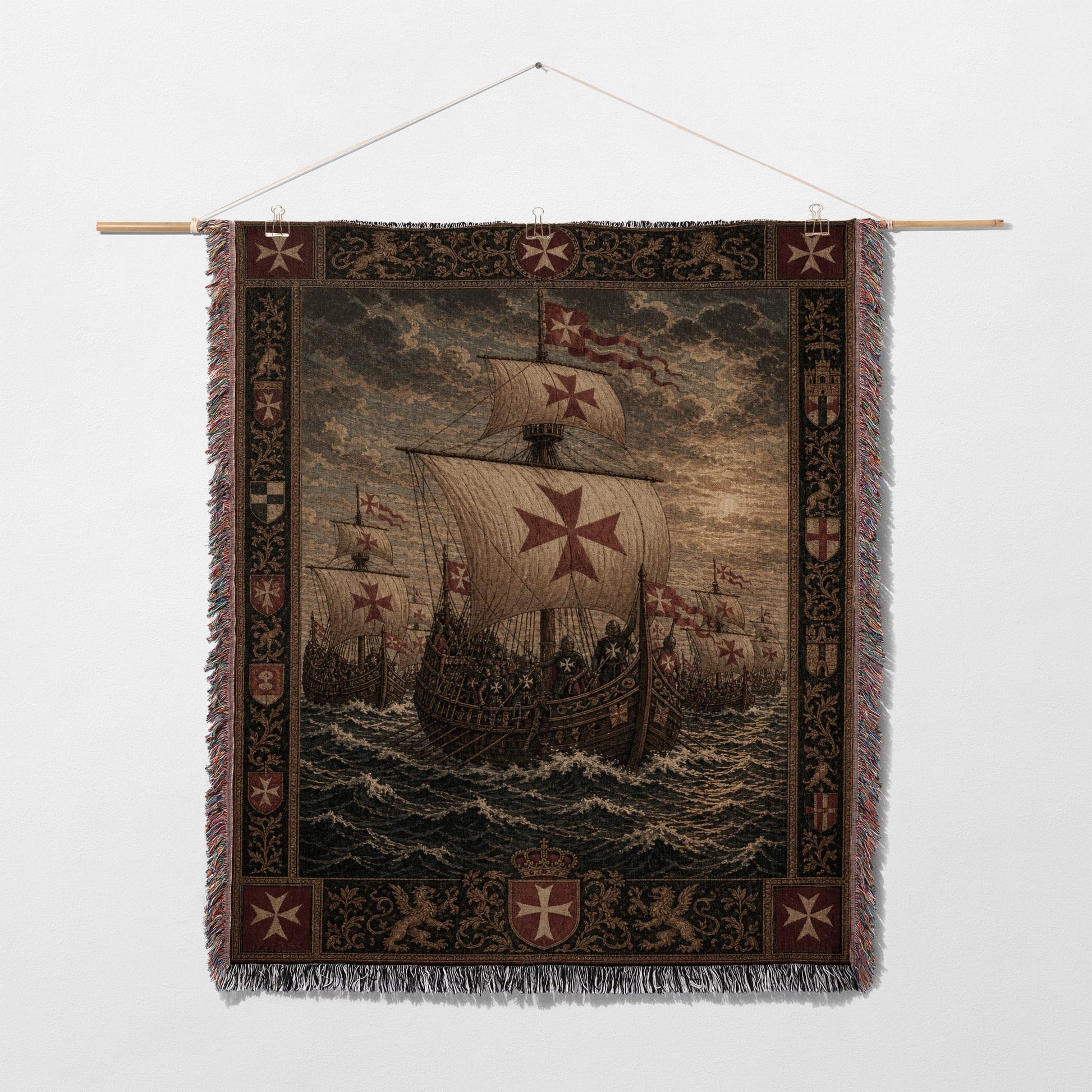 Tapestry depicting a fleet of ships with crusader crosses, set against a stormy sea.