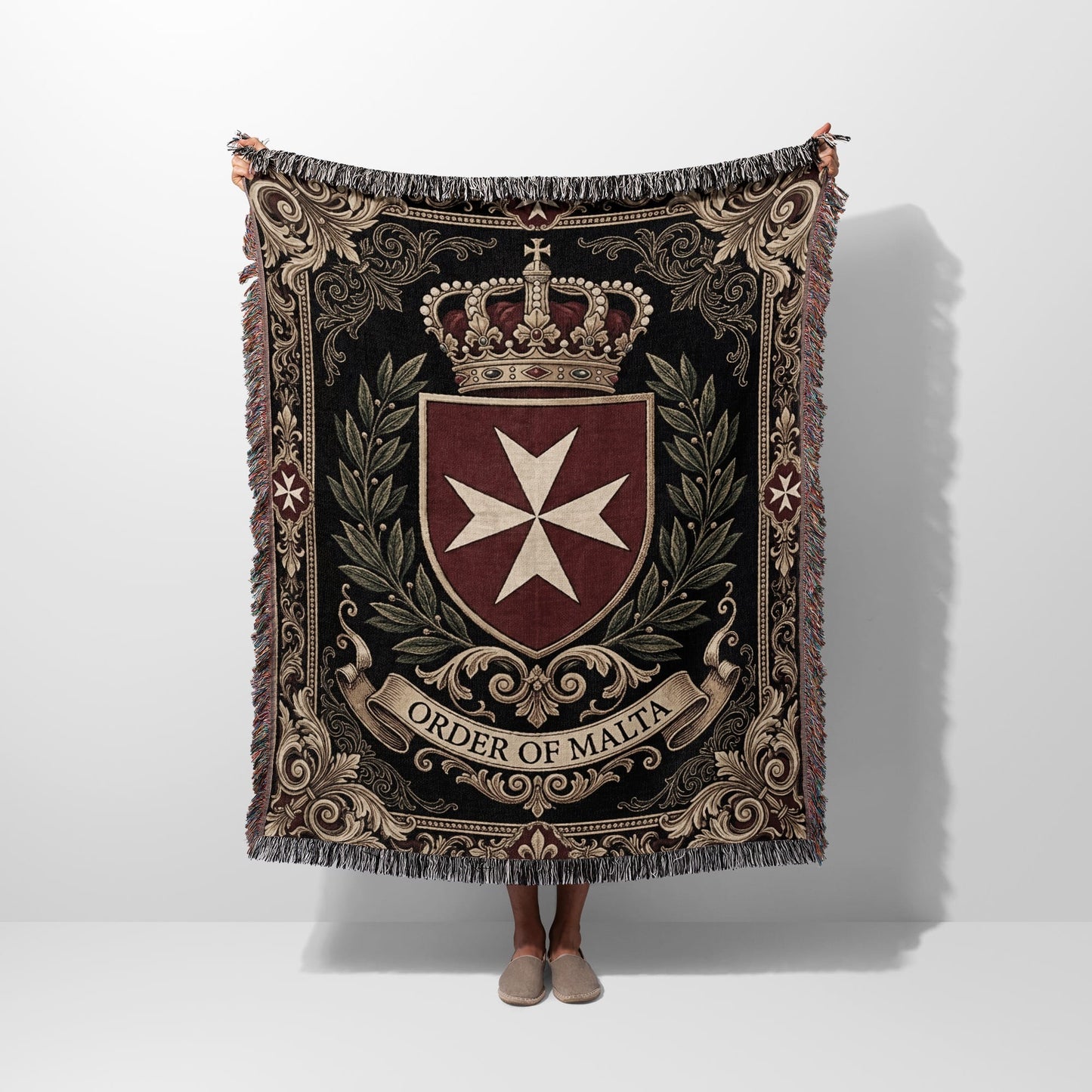 Tapestry blanket with Order of Malta emblem and crown.