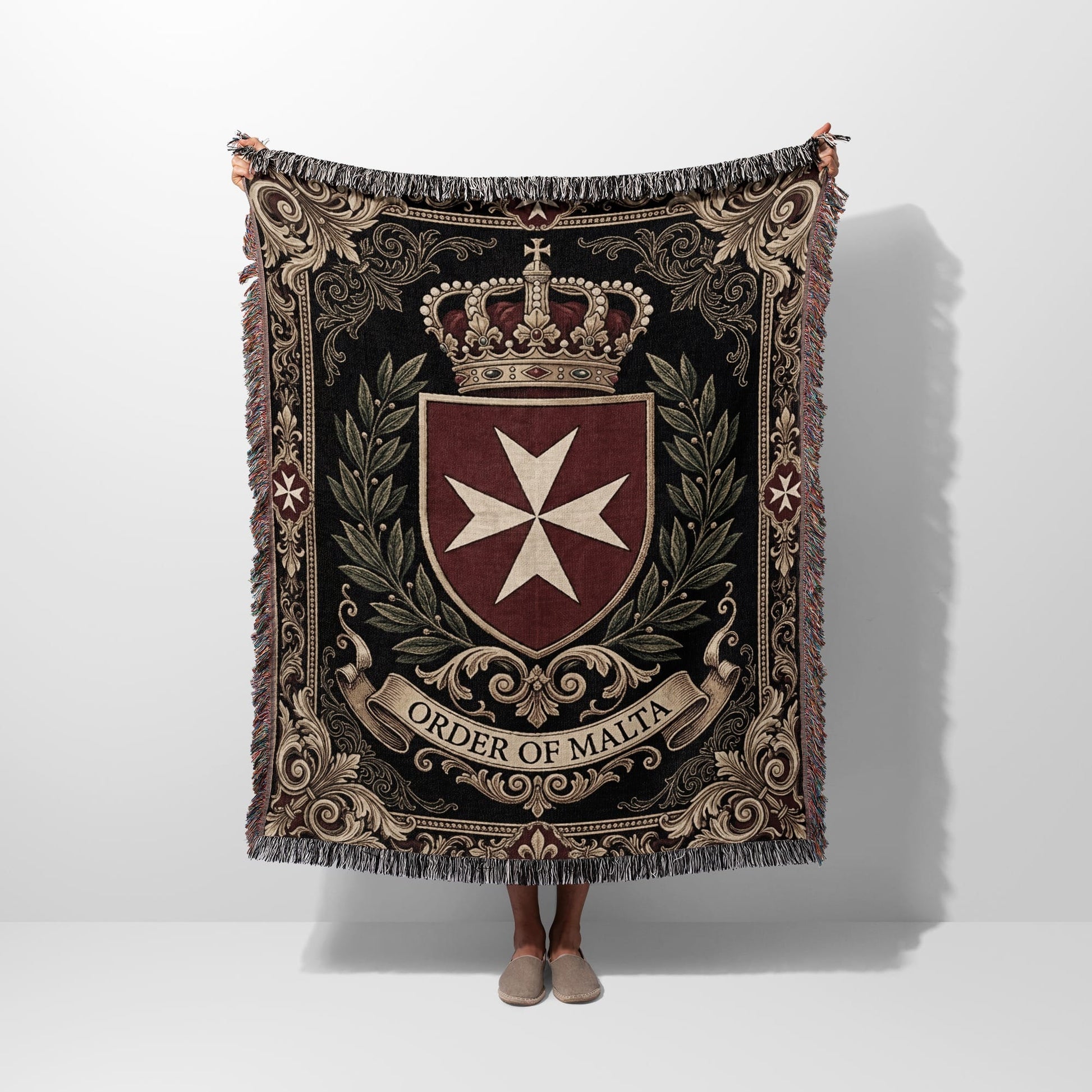 Tapestry blanket with Order of Malta emblem and crown.