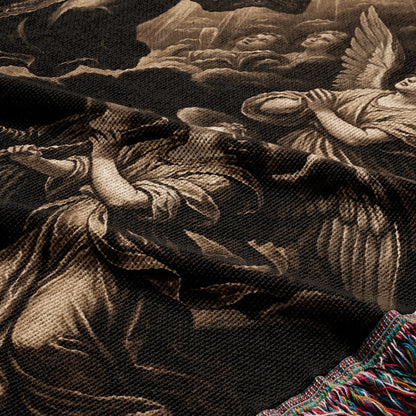 Tapestry with angels in a celestial scene, fringed edge visible.