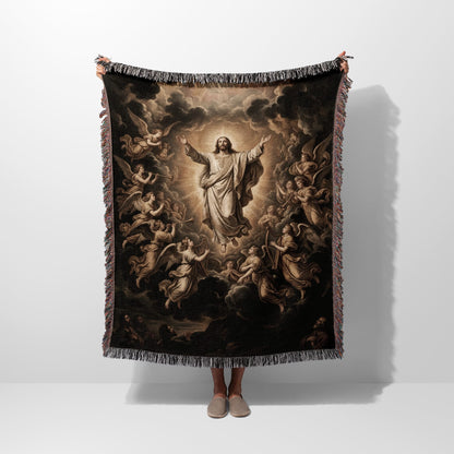 Jesus with arms outstretched, surrounded by angels, on a decorative throw blanket.