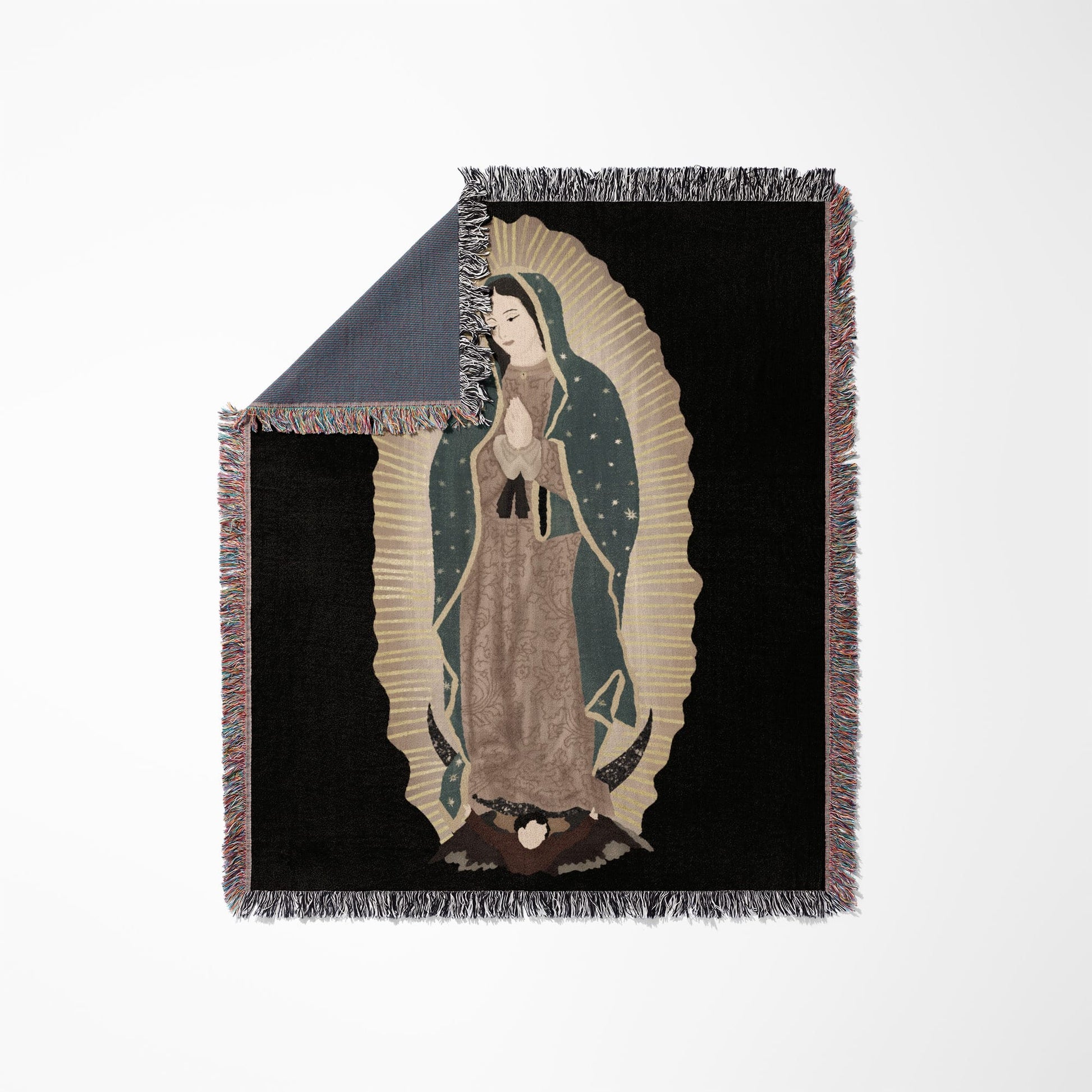 Woven blanket with an image of Our Lady of Guadalupe in gold and brown.