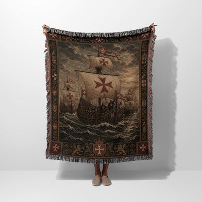 Tapestry blanket with ships and Maltese crosses.