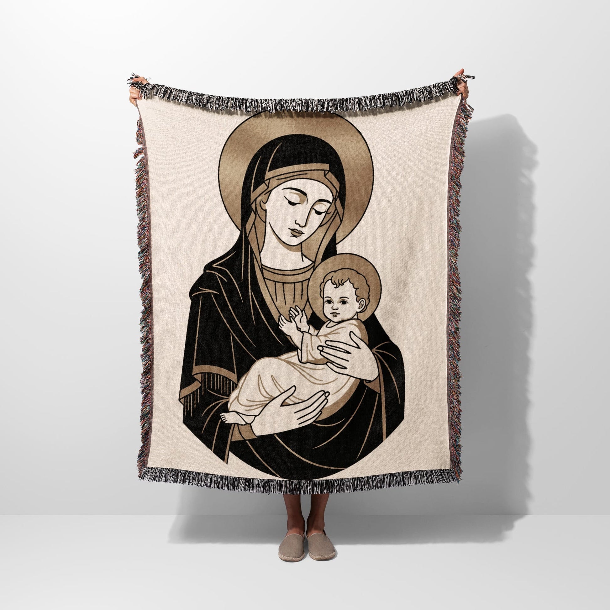 Illustration of Madonna and Child on a woven blanket held up by a person.