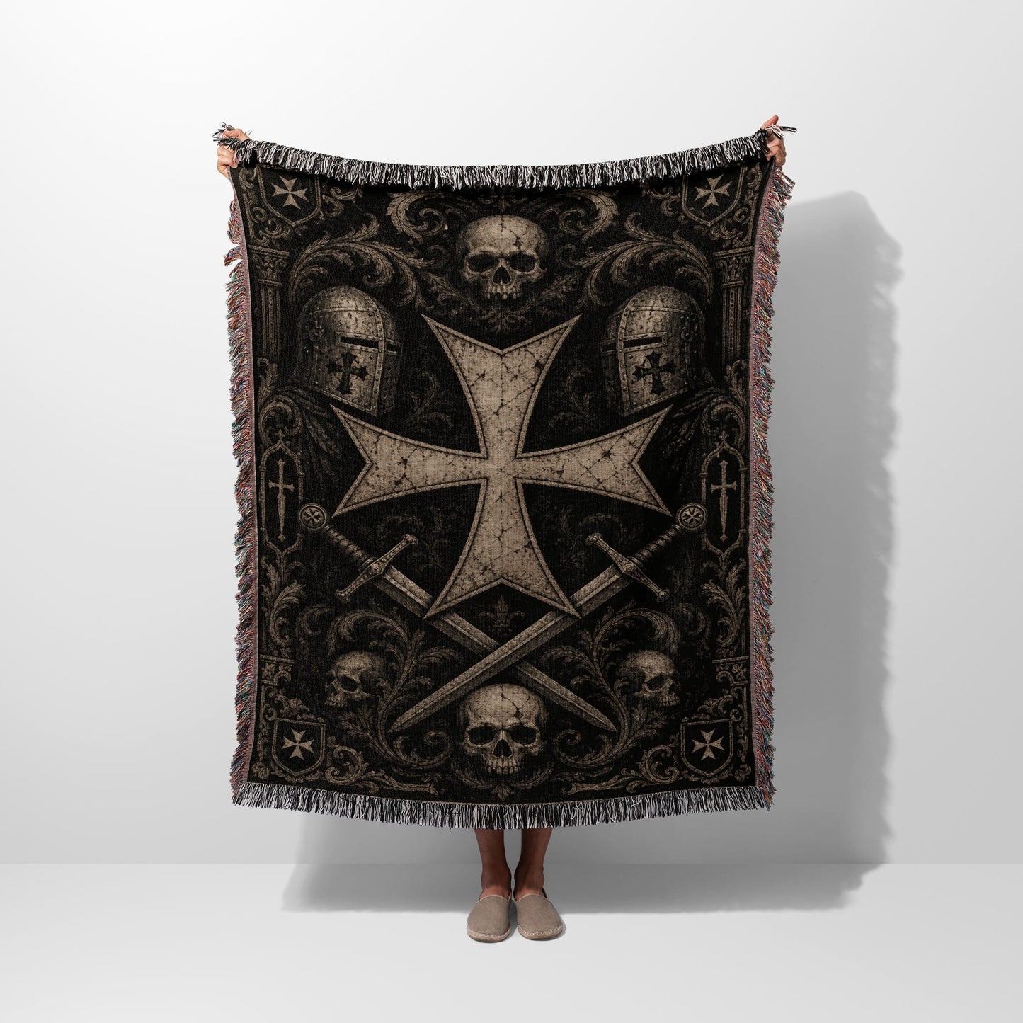 Tapestry blanket with a large Templar cross, swords, helmets, and skulls.