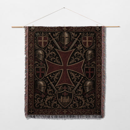 Tapestry with a large red Templar cross, swords, and knight helmets.