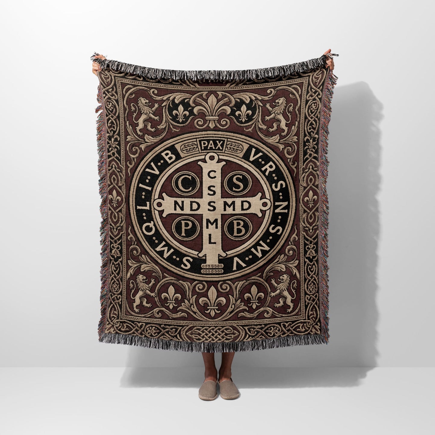 Tapestry with St. Benedict's medal design, lions, fleur-de-lis, and celtic knots.
