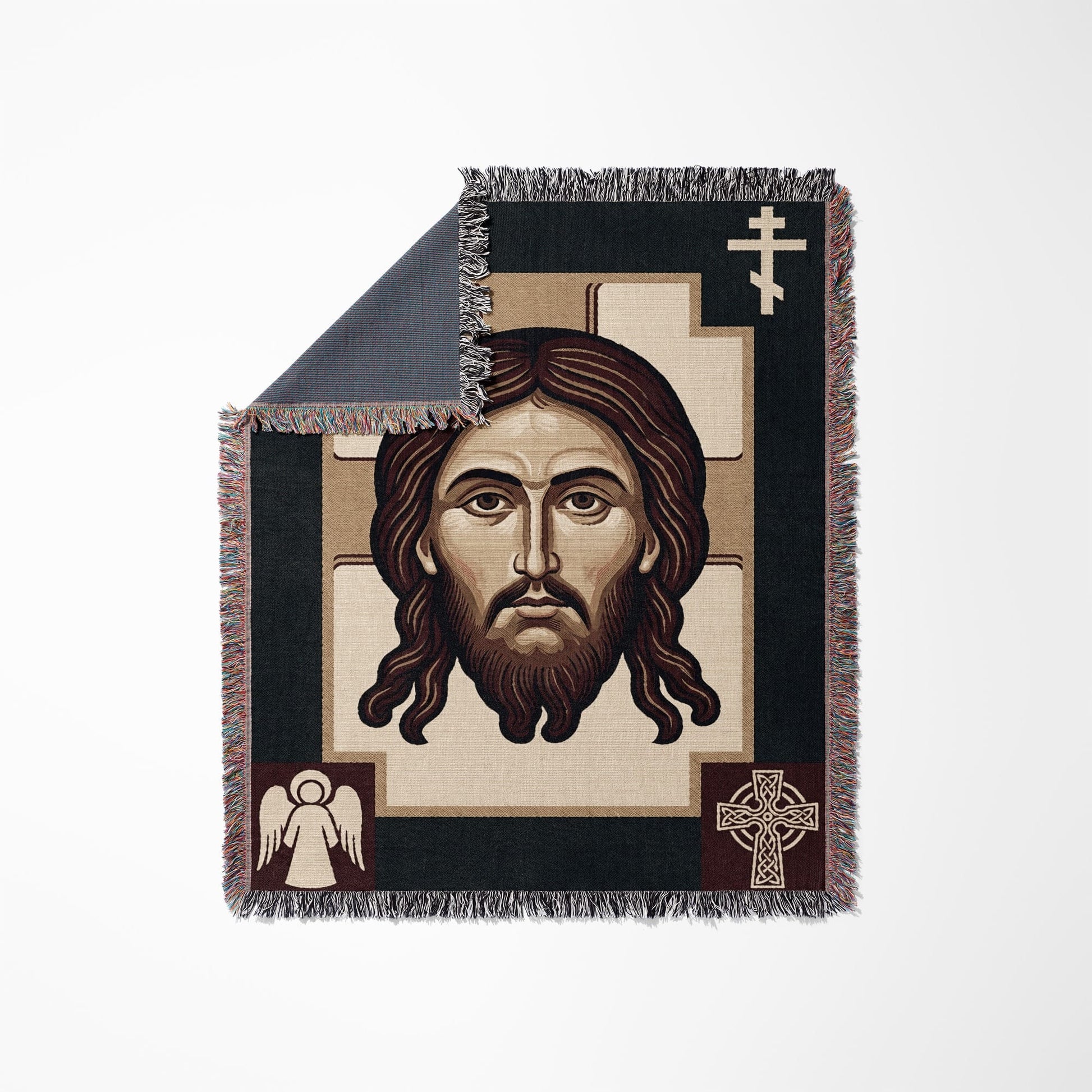 Woven blanket featuring a portrait of Jesus Christ and religious symbols.