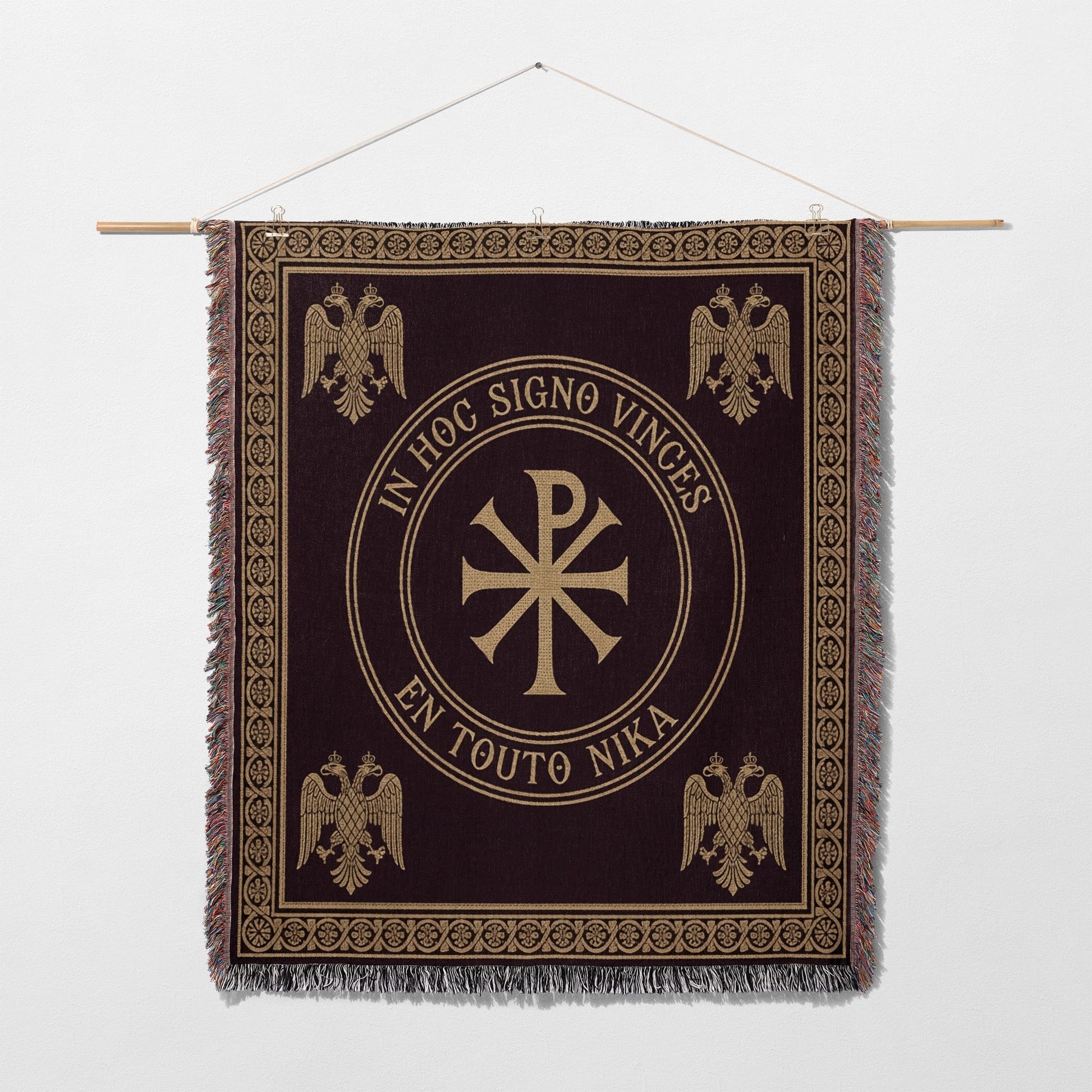 Tapestry with Christian Chi Rho symbol, eagles, and Latin text "In Hoc Signo Vinces".