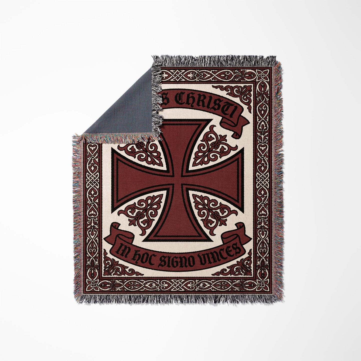 Throw blanket with a large red Templar cross and Latin inscription.