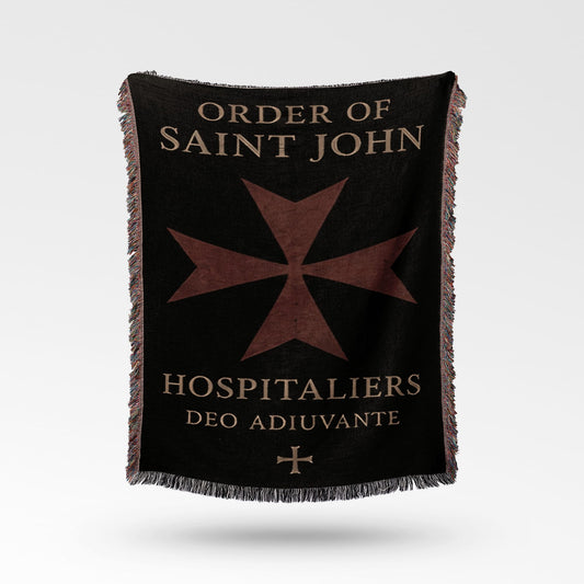 Black blanket with Order of Saint John cross and text.
