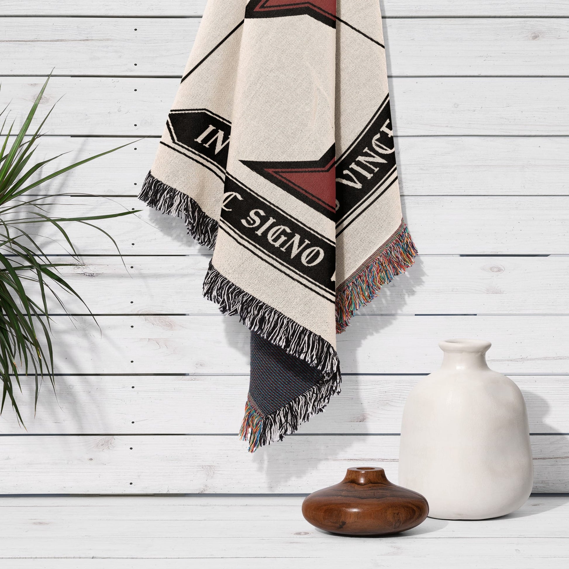 Cream and black striped throw blanket with "IN HOC SIGNO VINCES" text.