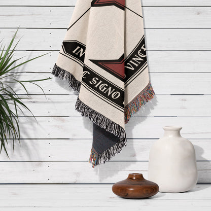 Cream and black striped throw blanket with "IN HOC SIGNO VINCES" text.