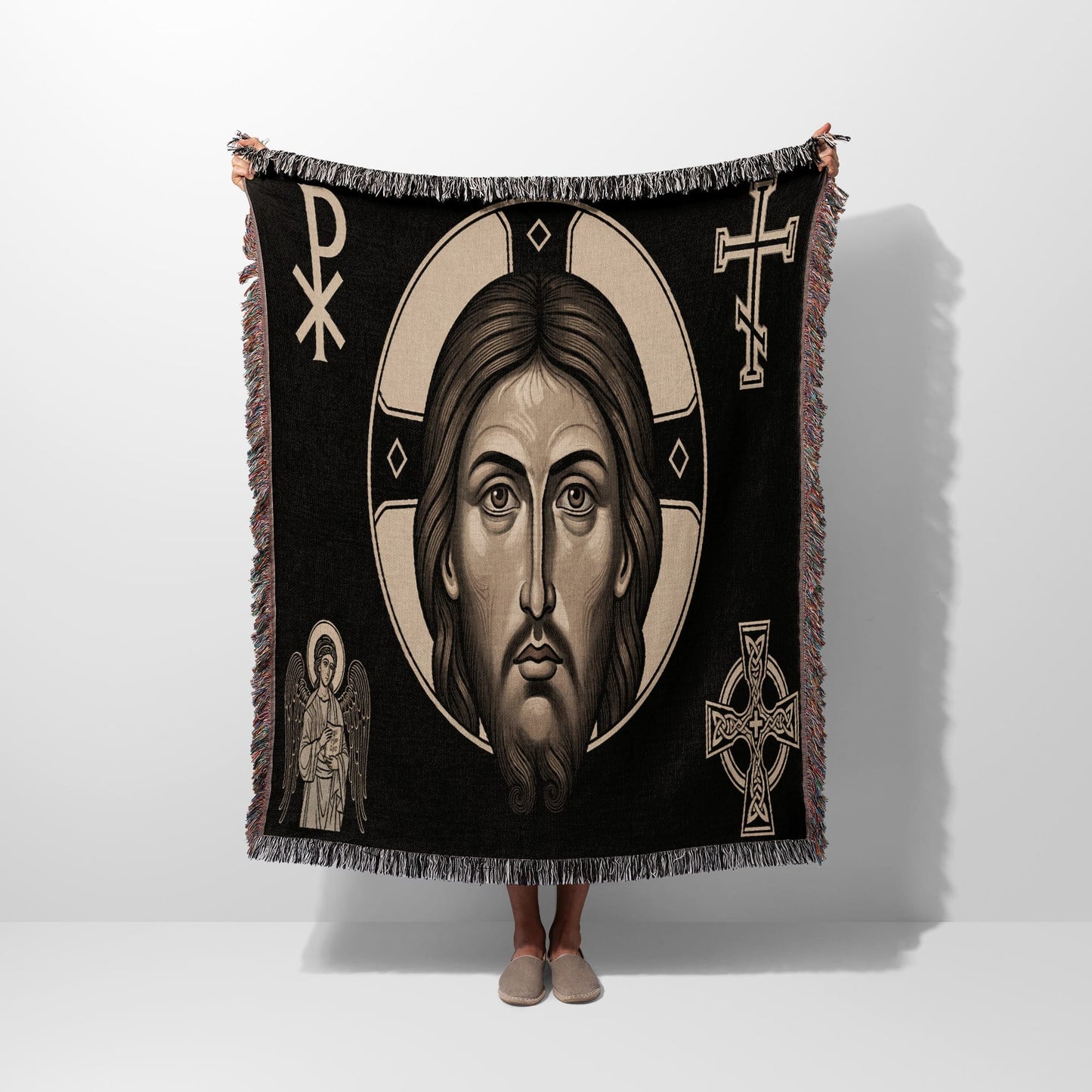 Blanket with Jesus portrait, angel, and Christian crosses.