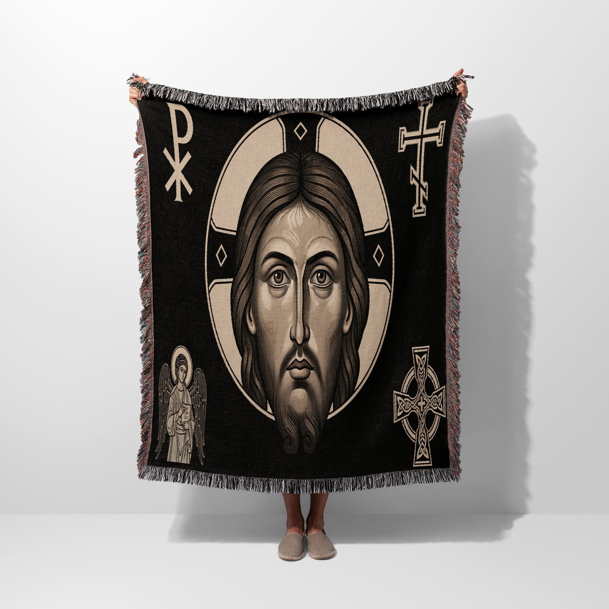 Blanket with Jesus portrait, angel, and Christian crosses.