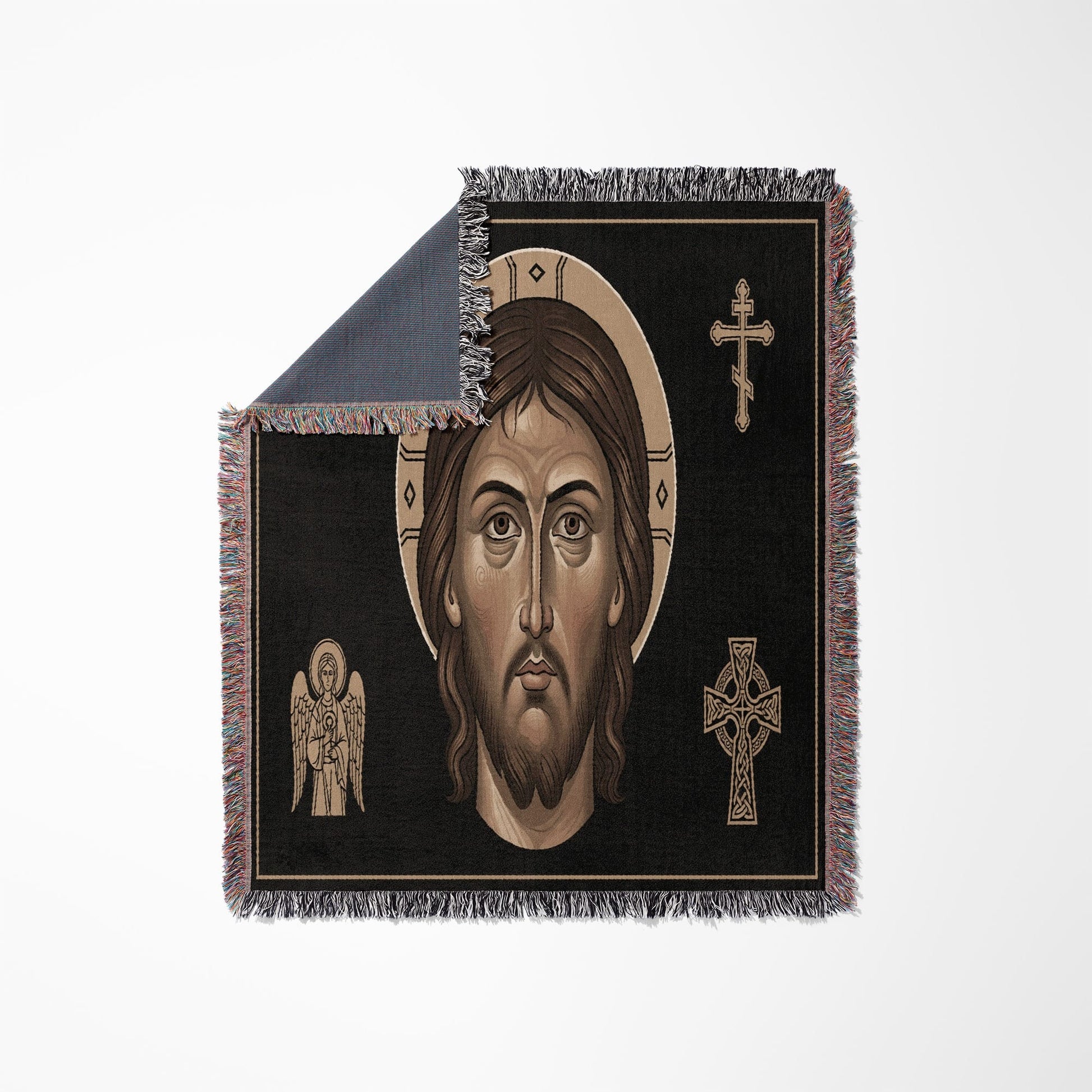 Woven throw blanket featuring a central icon of Jesus Christ and angelic figures.
