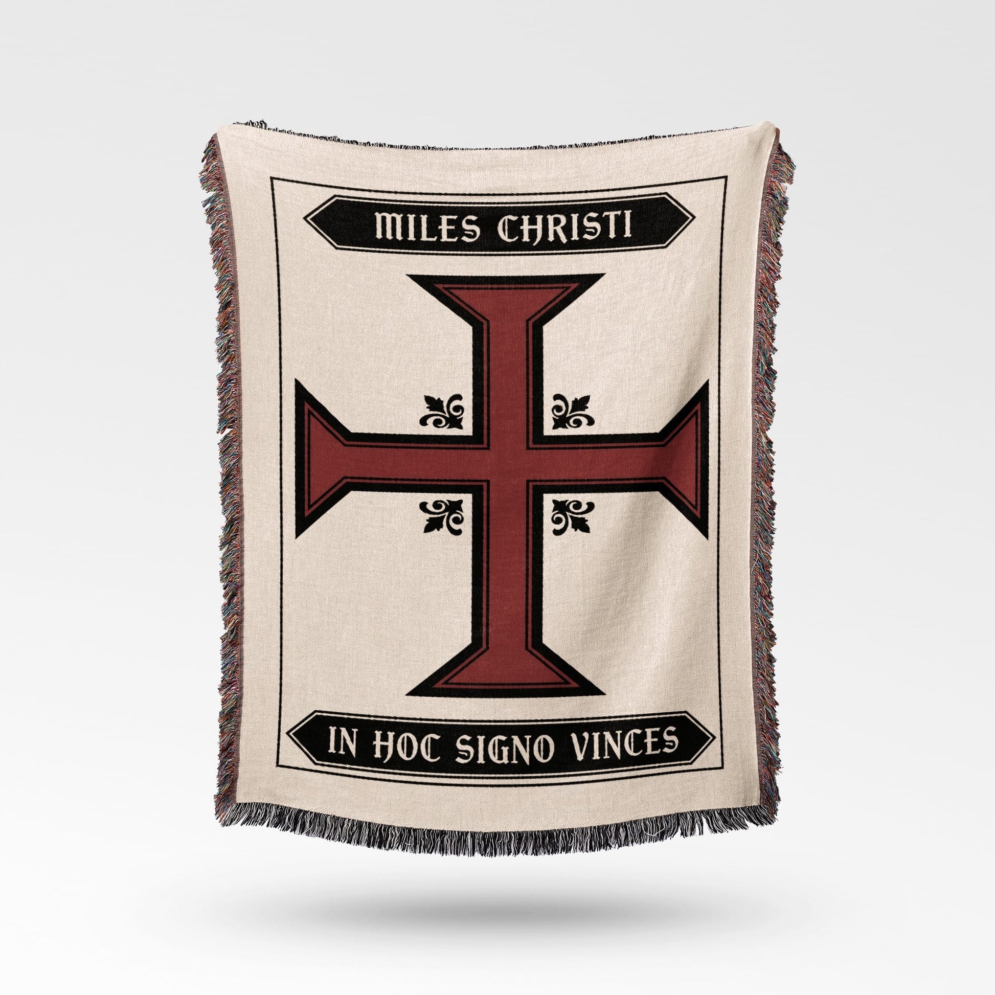 Cream blanket with a red and black Templar cross and Latin text.