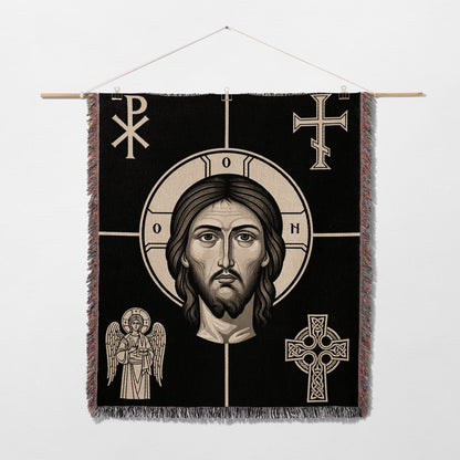 Religious tapestry with Christ's face, angels, and crosses.