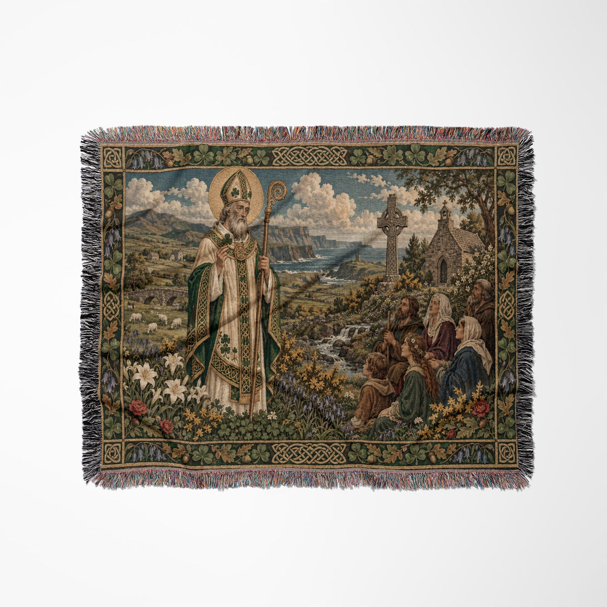 Woven tapestry blanket depicting Saint Patrick standing before a pastoral Irish landscape with people gathered.