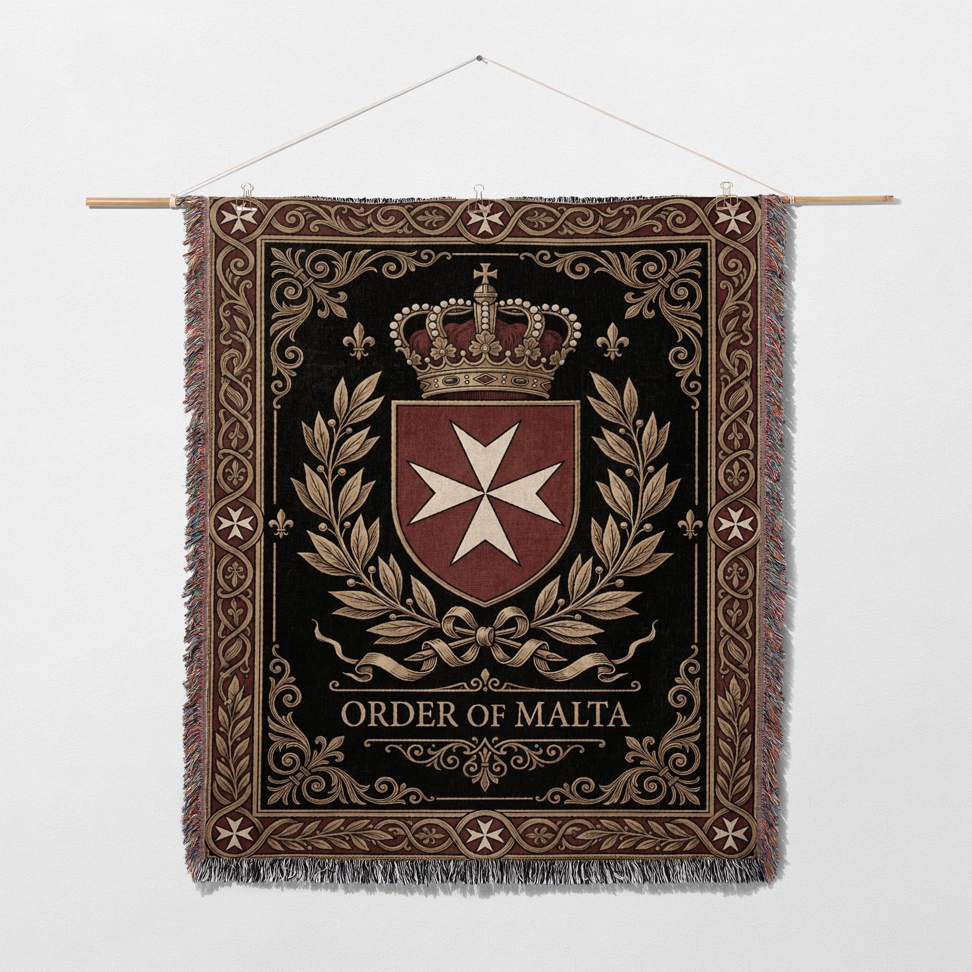 Tapestry with the Order of Malta crest, crown, and ornate border.