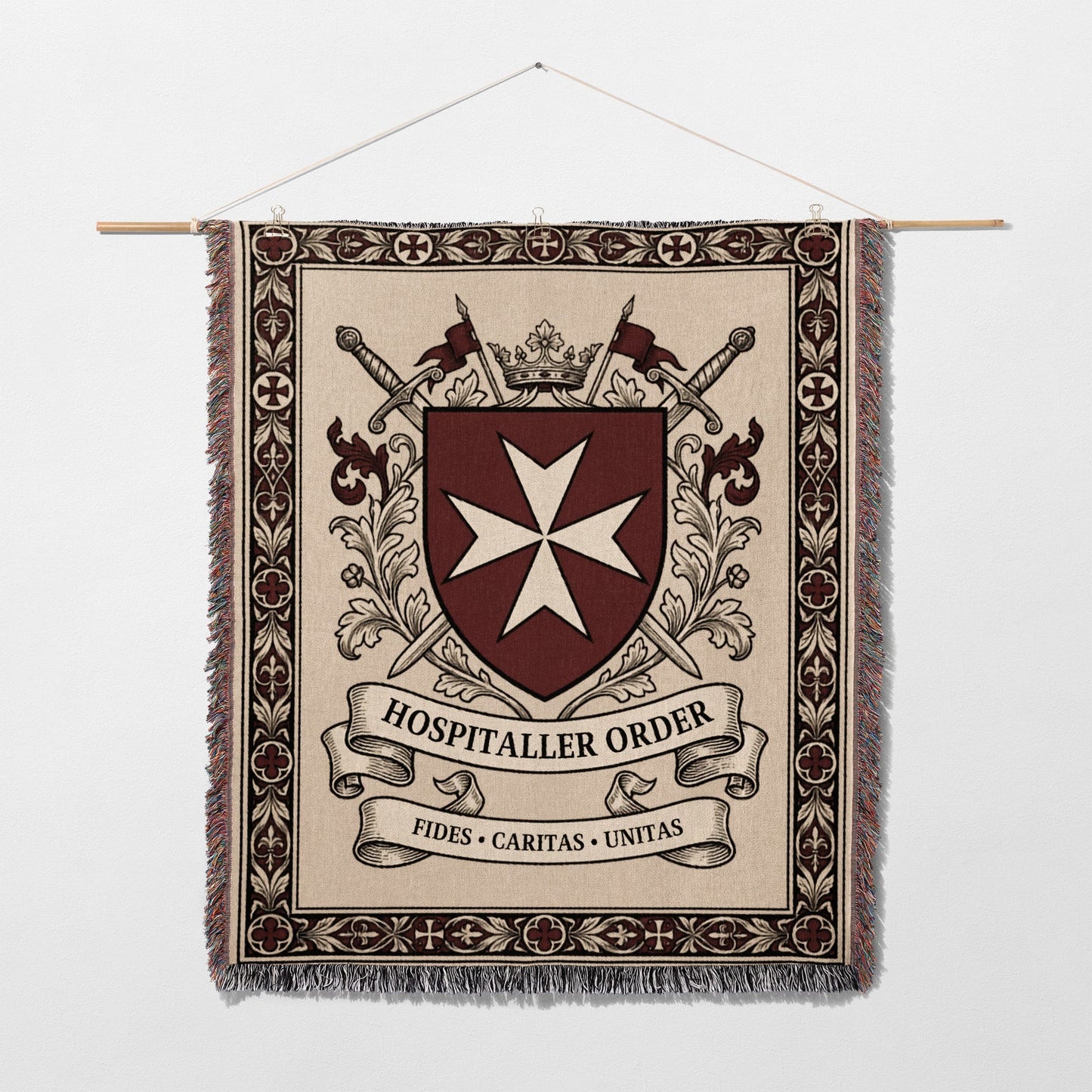 Tapestry with Hospitaller Order crest, swords, crown, and credo text.