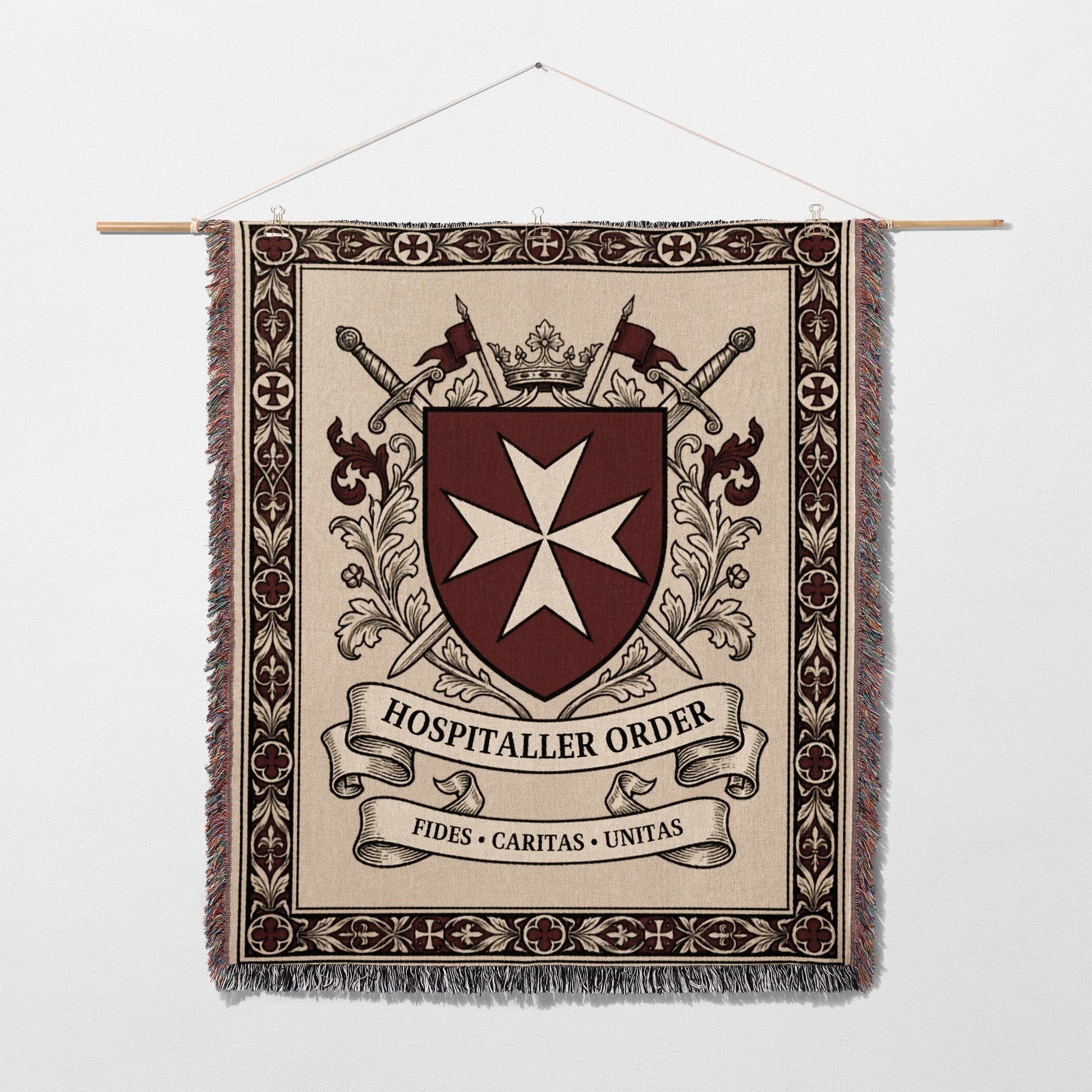 Tapestry with Hospitaller Order crest, swords, crown, and credo text.