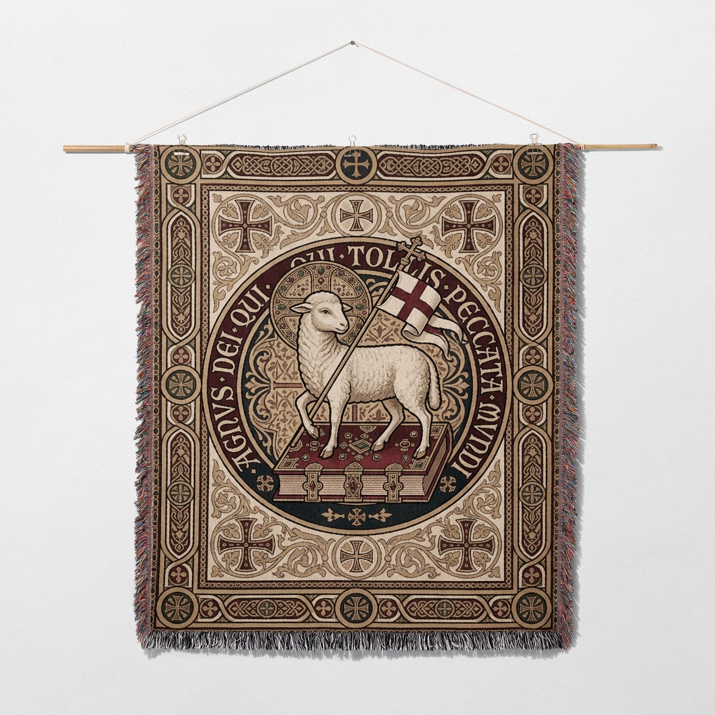 Tapestry depicts a lamb with a banner on a book, surrounded by religious symbols.